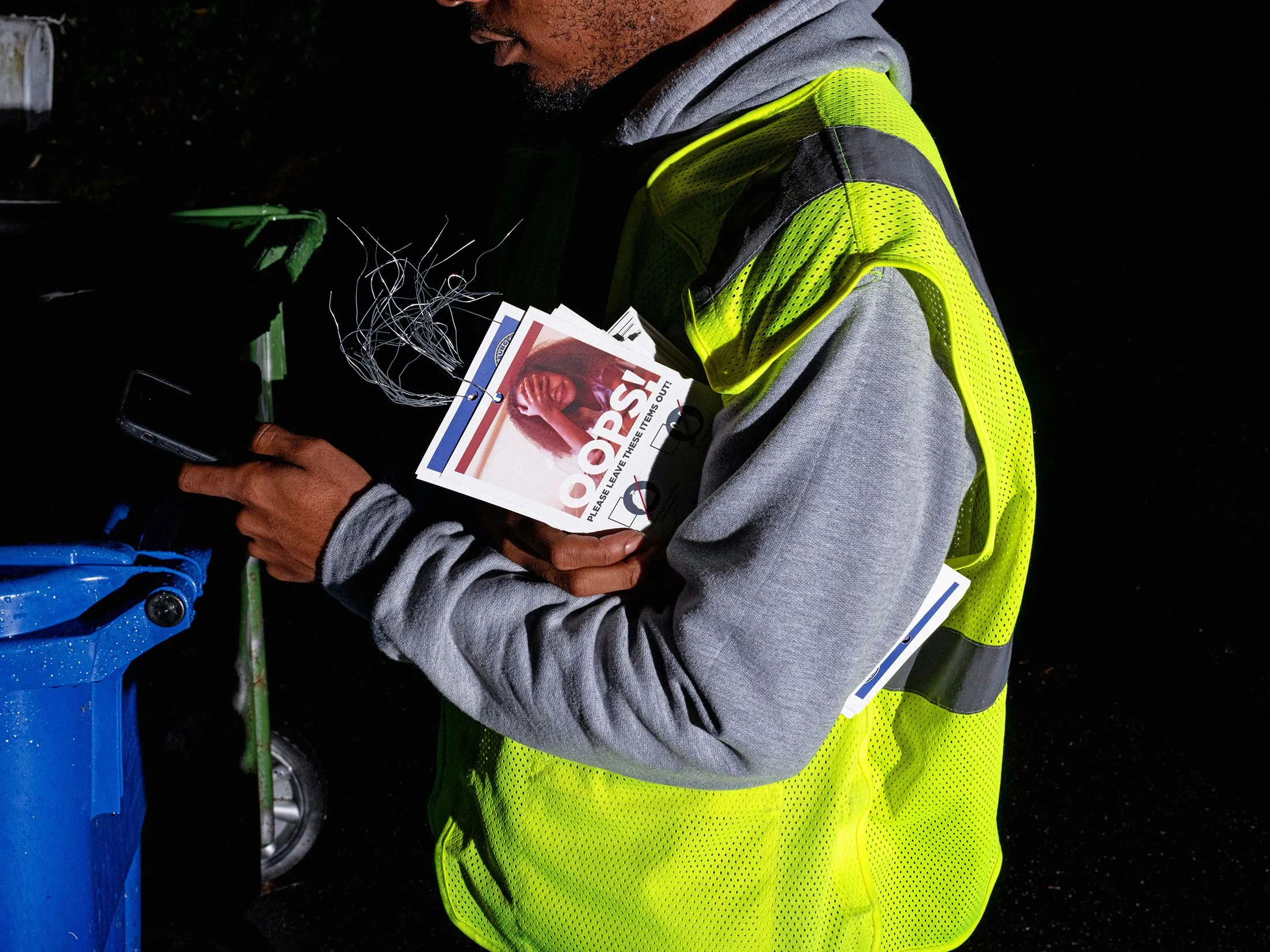 A recycling inspector in Atlanta takes pictures of items that don’t belong in the pail.