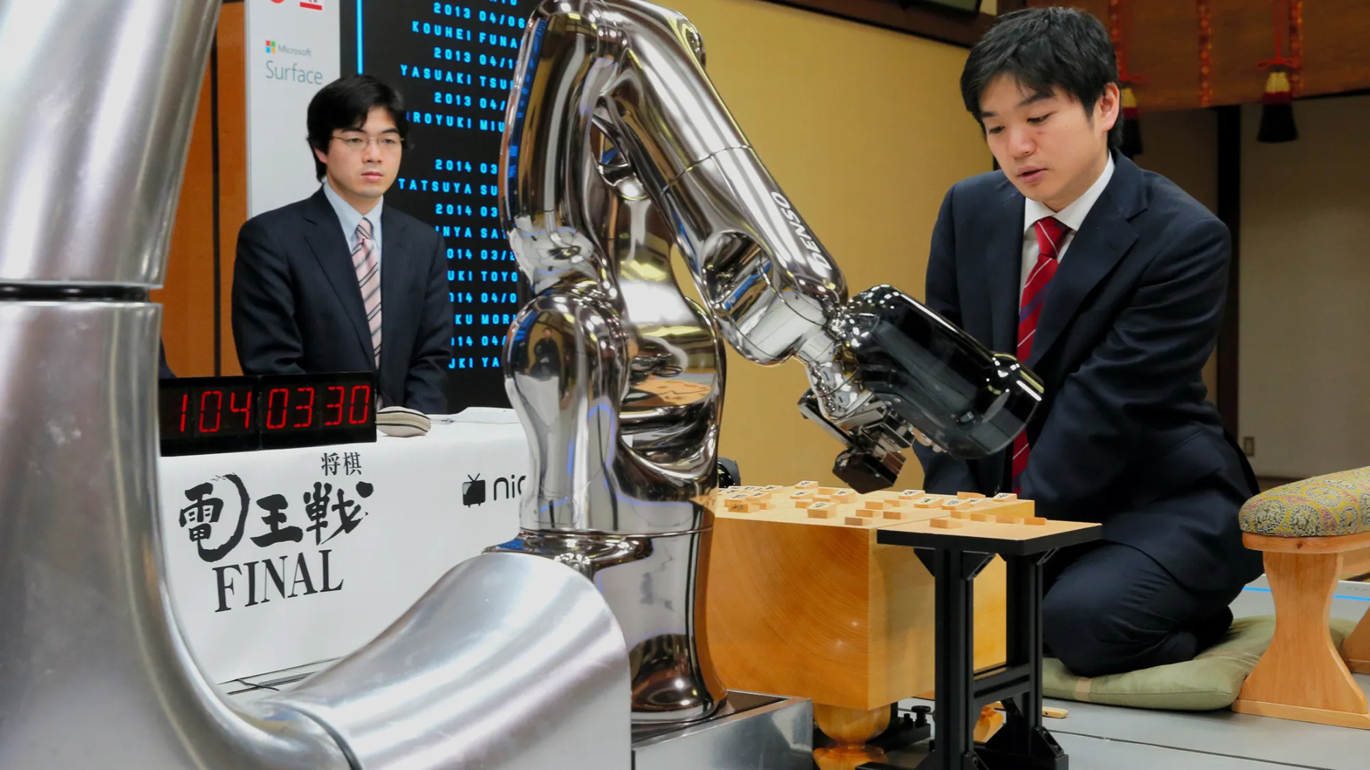 Professional shogi, or Japanese chess player, versus a computer.
