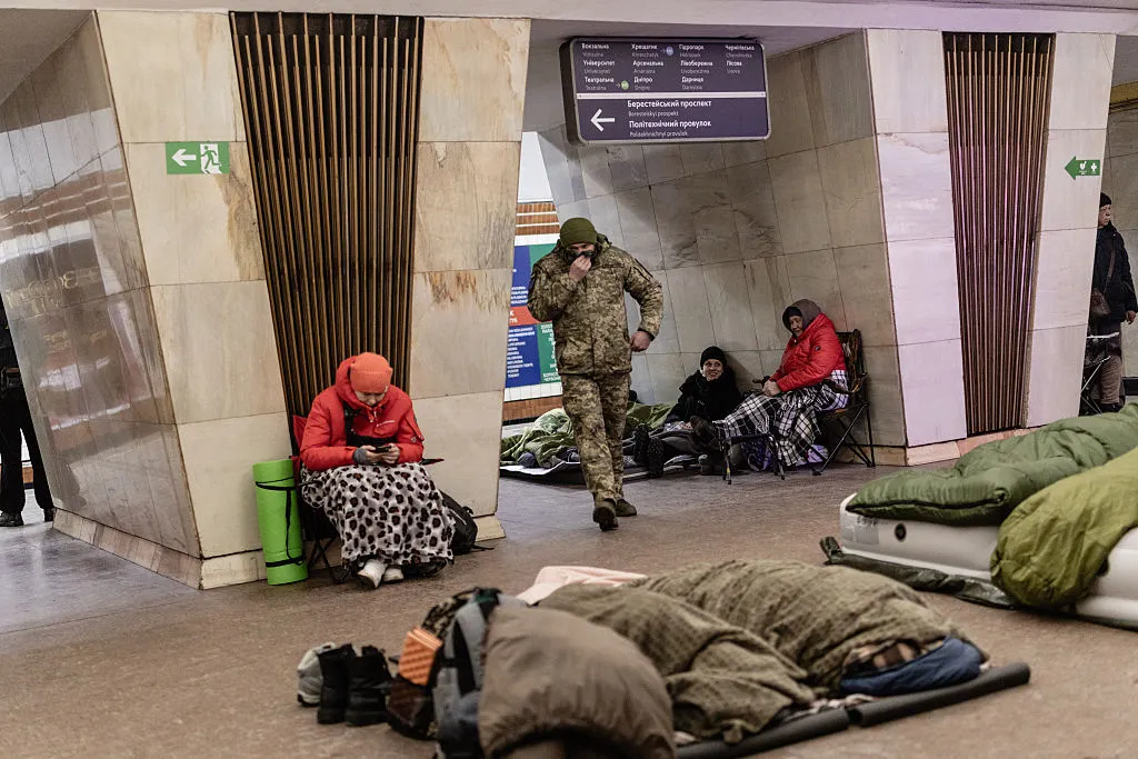Residents shelter in a metro station during missile strikes in Kyiv, on Feb. 7.