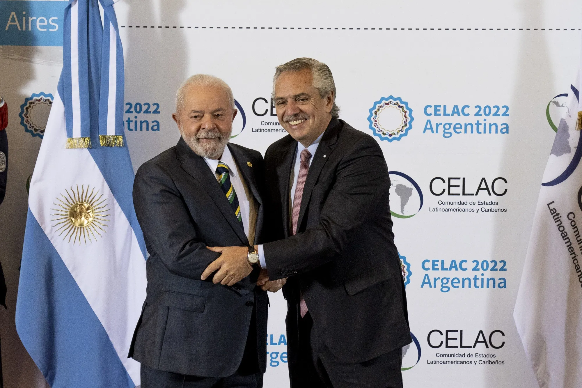 Argentina’s Alberto Fernandez welcomes Brazil’s Luiz Inacio Lula da Silva, left, during the Celac Summit in Buenos Aires on Jan. 24.