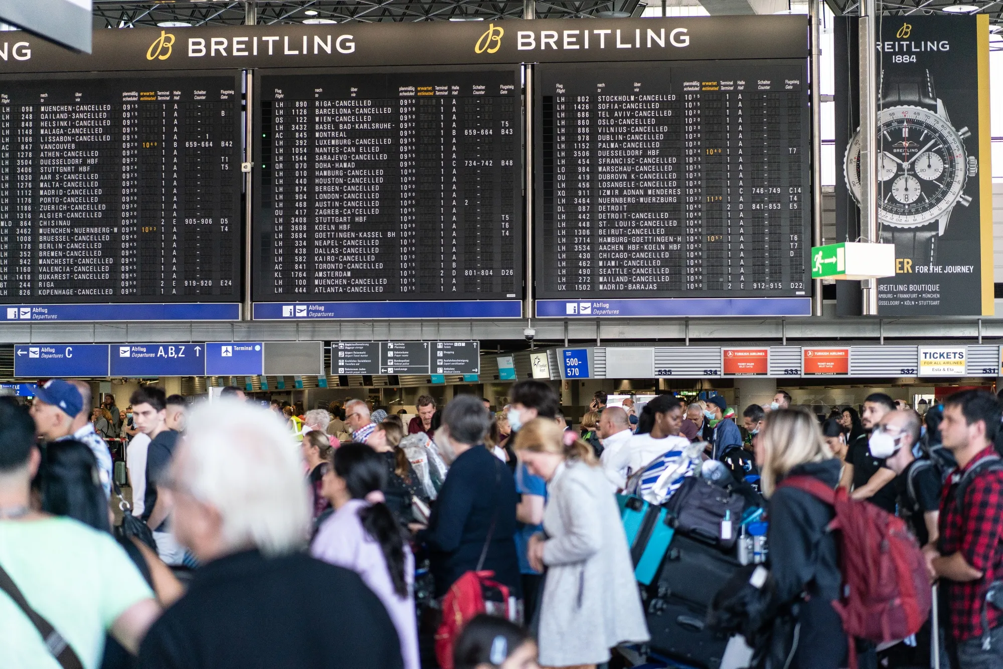 Passengers during a Lufthansa workers strike, at Frankfurt Airport in July.