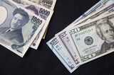 Japanese Yen and U.S. Dollar Banknotes Ahead of US-Japan Trade Talks