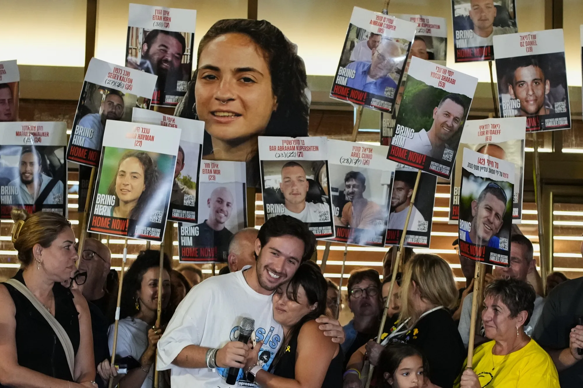 Relatives and supporters of Israeli hostages held by Hamas in the Gaza Strip celebrate following the announcement that Israel and Hamas have agreed to the first phase of a peace plan&nbsp;in Tel Aviv on Oct. 9.