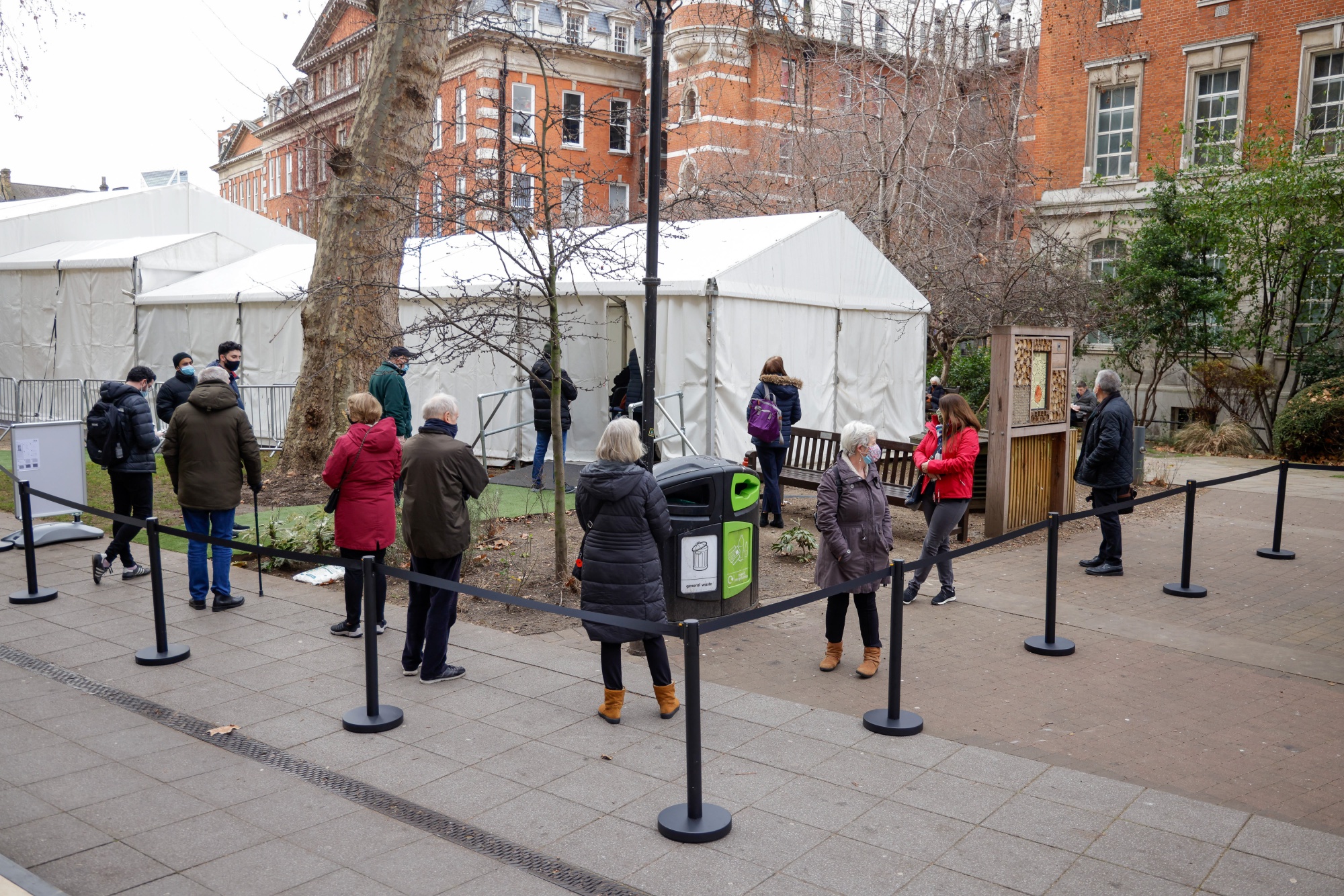 Visitors queue outside a Covid-19 vaccination center&nbsp;at Guys hospital in London, on Jan. 11.