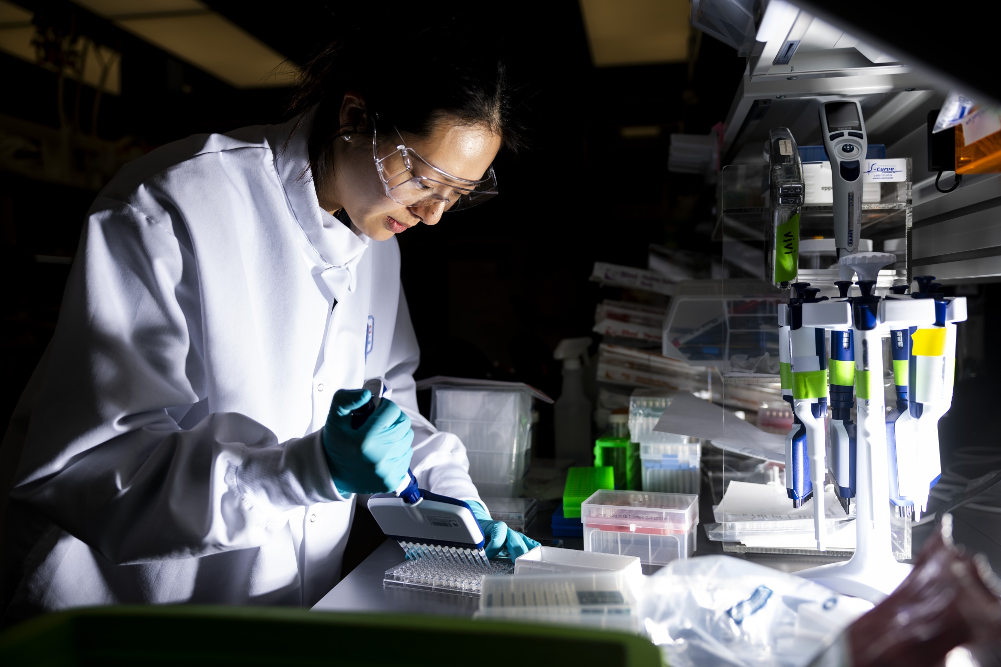 A researcher works in the lab at the Moderna headquarters in Cambridge, Massachusetts.
