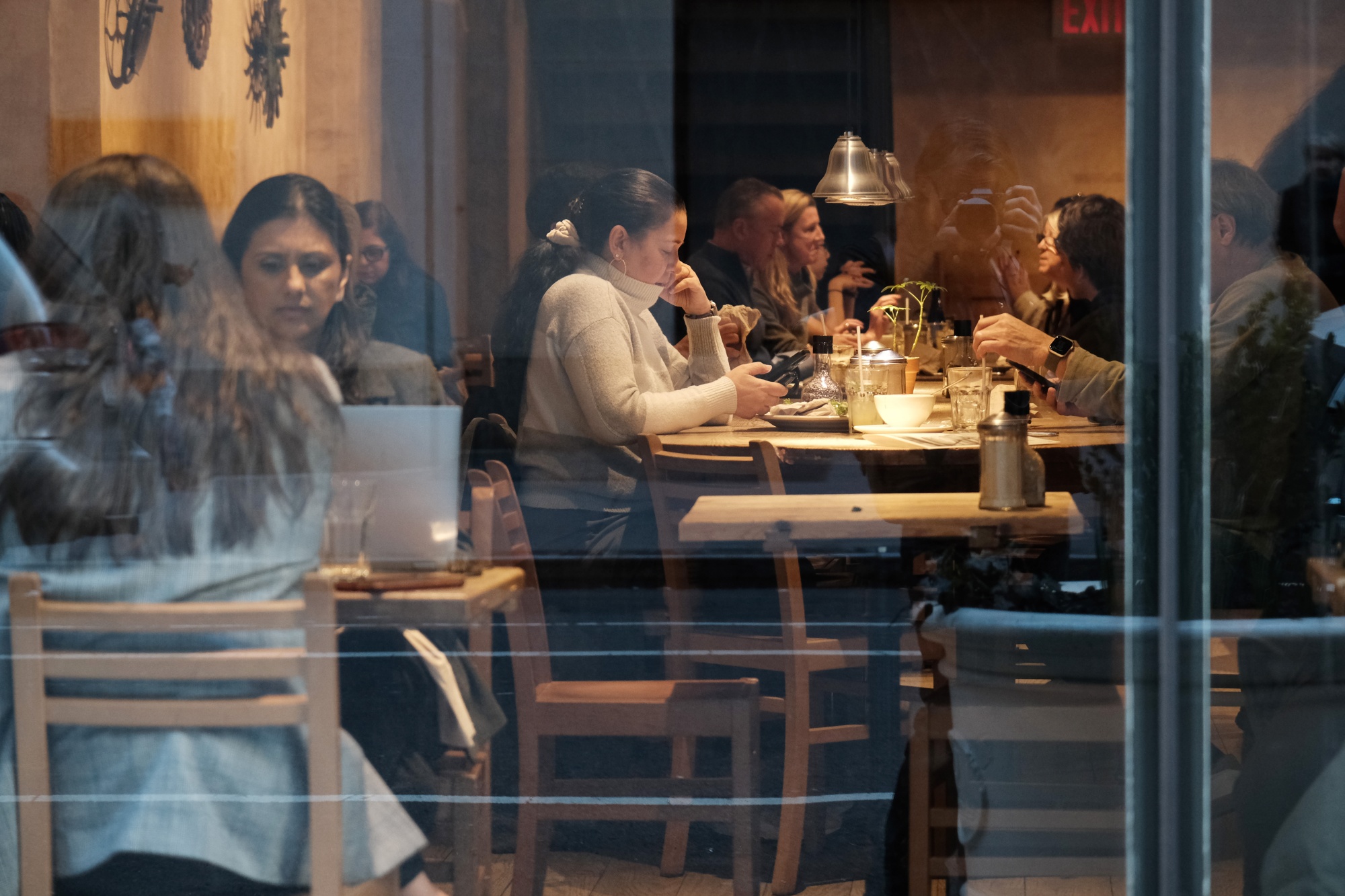 People eat in a Manhattan restaurant on March 9, 2023 in New York City.