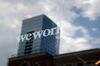 CHICAGO, ILLINOIS - AUGUST 14: A sign marks the location of a WeWork office facility on August 14, 2019 in Chicago, Illinois. WeWork, a real estate firm that leases shared office space, announced today that it had filed a financial prospectus with regulators to become a publicly traded company. (Photo by Scott Olson/Getty Images)