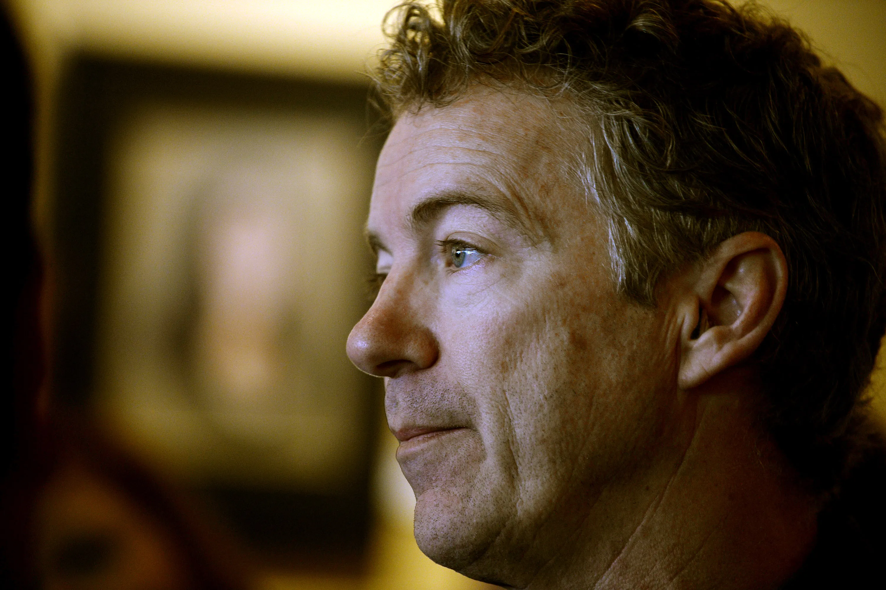 HAMPSTEAD, NH - MARCH 21: U.S. Senator Rand Paul (R-KY) listens to a question after speaking at Beantowne Coffee House &amp; Cafe March 21, 2015 in Hampstead, New Hampshire. Paul, who has made many trips to New Hampshire which holds the first primary in the nation, has set a date in early April to decide on whether he will or will not run for president.
