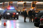 School buses are lined up in front of Great Mills High School after a shooting on March 20, 2018 in Great Mills, Maryland.&nbsp;