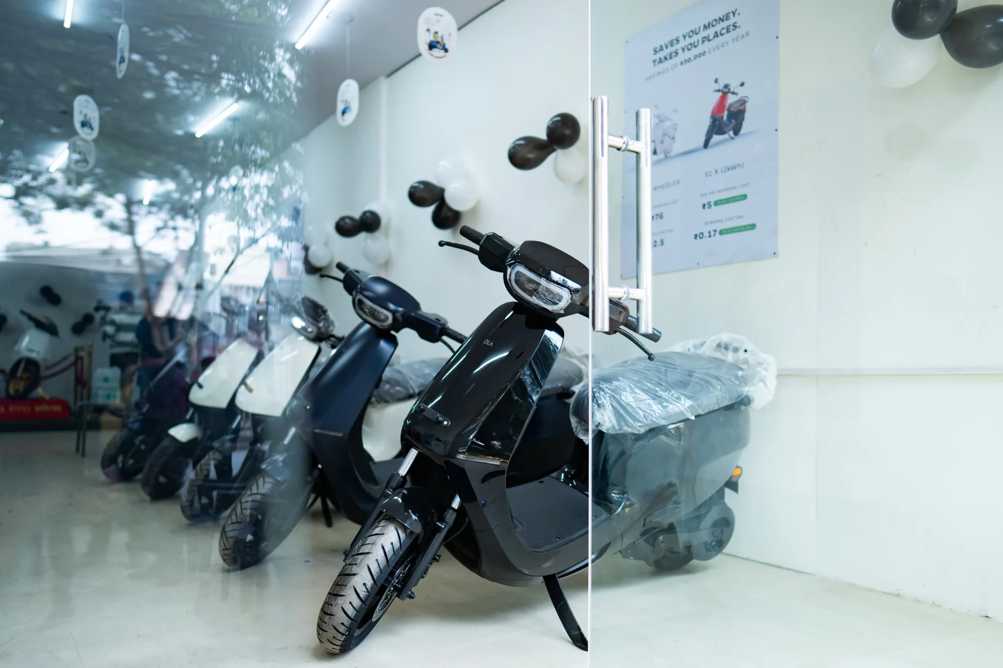 Ola Electric scooters at one of the company's new stores in New Delhi on Dec. 25.