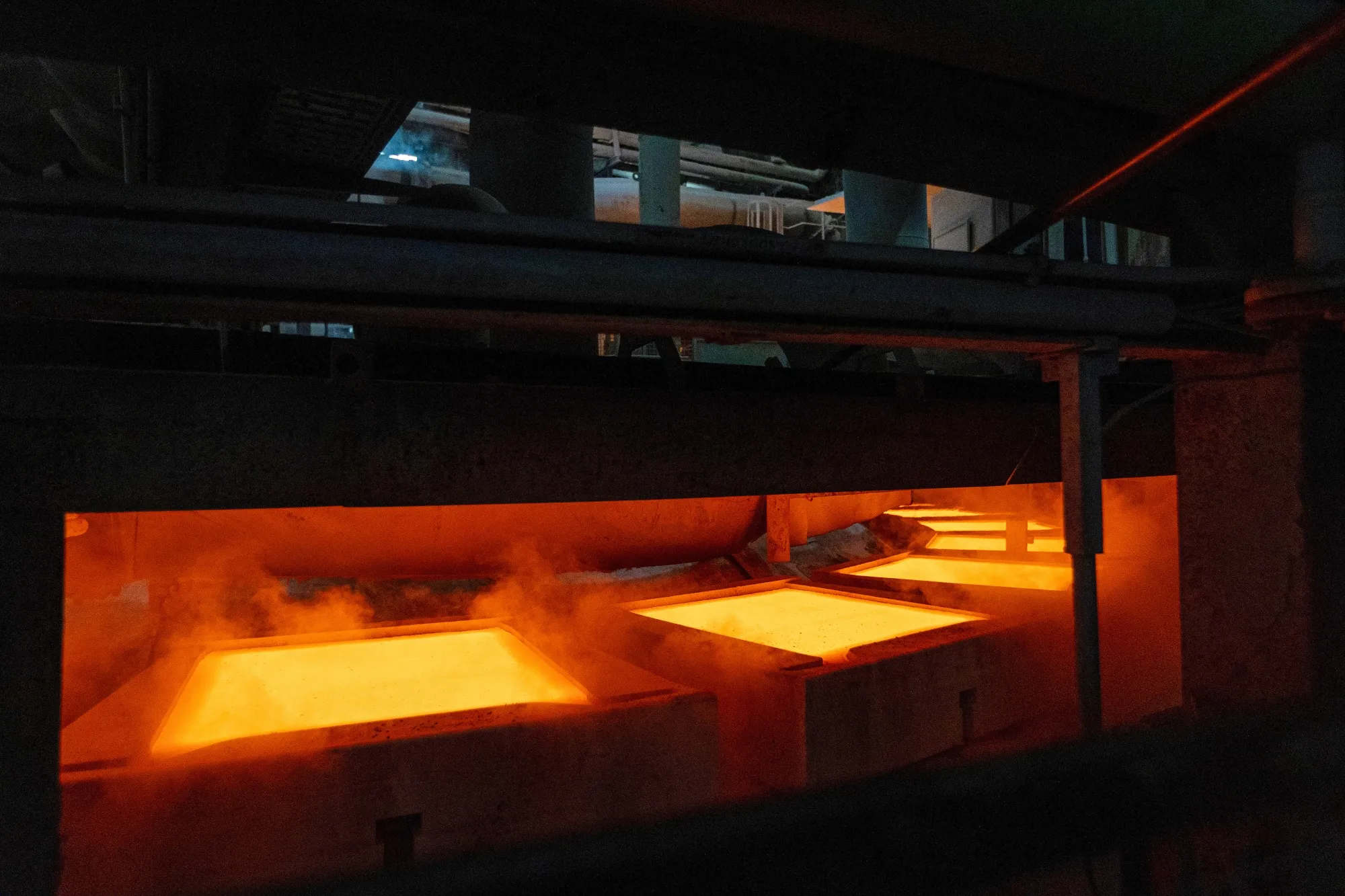 Molten copper in molds at a refinery in Hamburg, Germany.