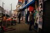 A vendor sets up a fabric shop near Walthamstow Market in London on Feb. 14.