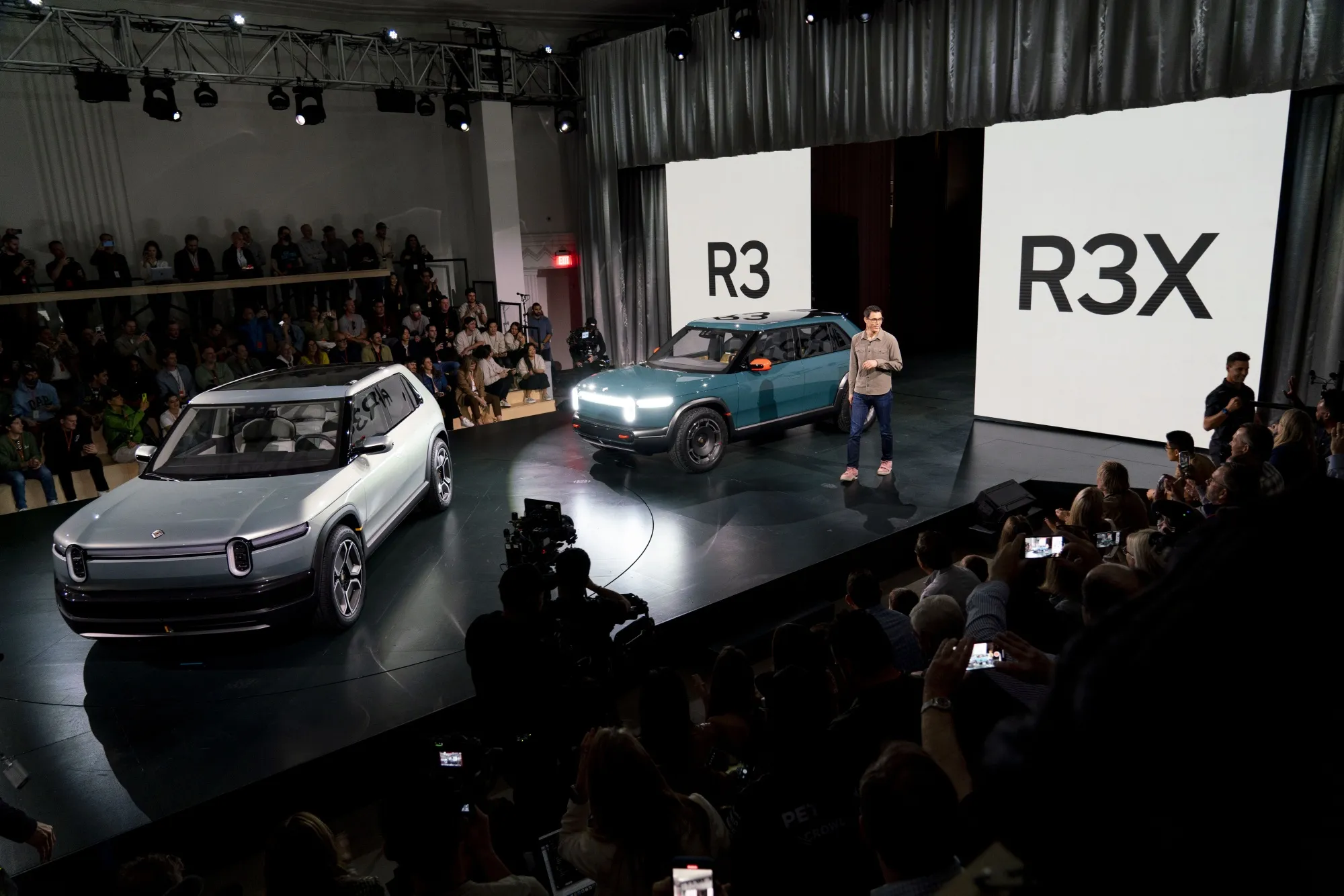 RJ Scaringe, chief executive officer and founder of Rivian Automotive Inc., unveils Rivian R3 and R3X prototype crossover electric vehicles.