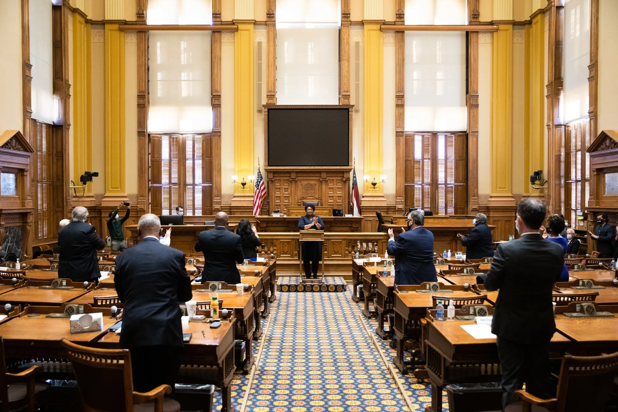 Members of the Electoral College applaud after casting their vote at the Georgia State Capitol in Atlanta, Georgia, on&nbsp;Dec. 14.