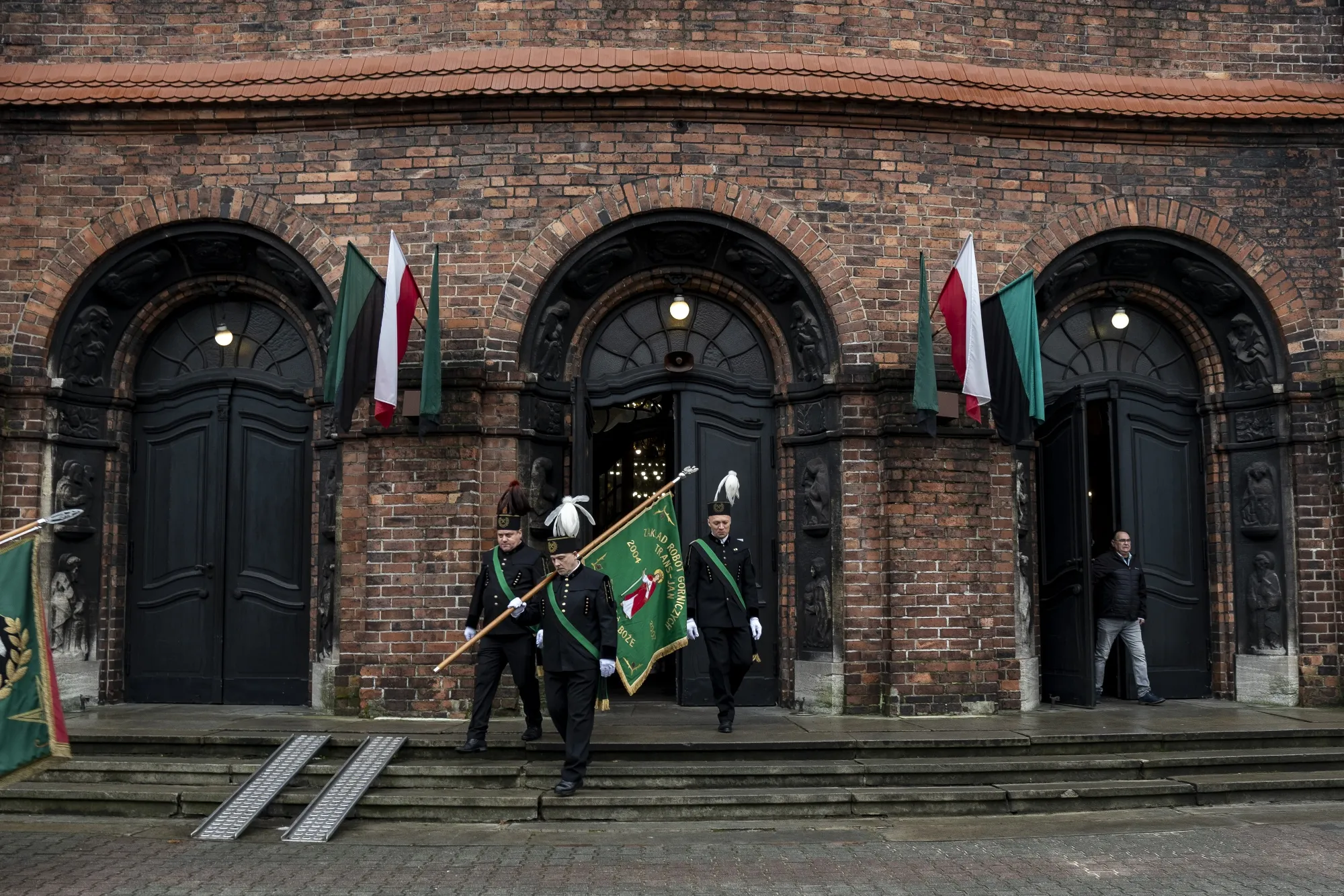 Miners, their families and residents of the Nikiszowiec housing estate after mass at St. Anne's Church&nbsp;in Katowice, Poland, on Dec. 4.