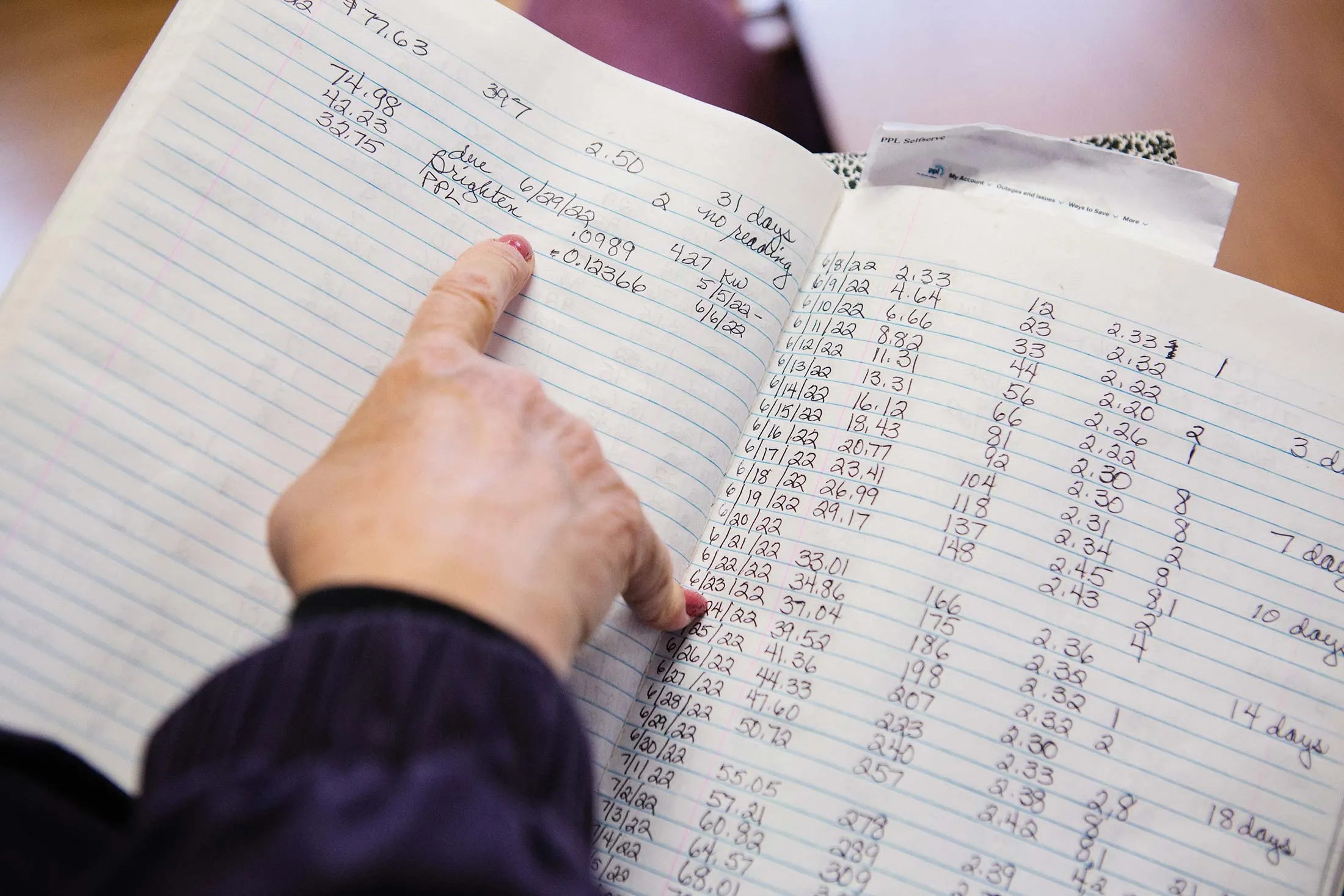 Kris Burek, a resident of Slatington, Pennsylvania, shows her handwritten daily energy usage log she has kept since she retired in 2018 on Thursday, February 26, 2026. The rising costs of energy and utility bills, particularly in the Lehigh Valley, could become central for voters in the upcoming midterm elections.