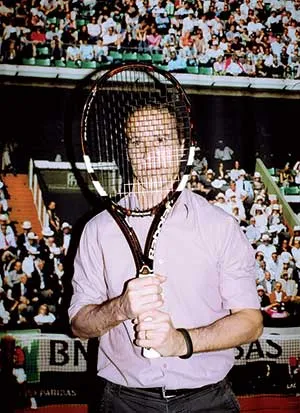 Babolat engineer Mace with his creation at the company’s lab in Lyon
