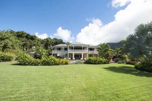 The house is part of the Four Seasons Resort Estates compound on the island.