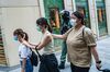 Demonstrators detained by riot police are escorted to police vehicles in the Causeway Bay district during a protest in Hong Kong, China.