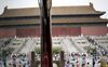 A girl is reflected in the window of a gift shop in the Forbidden City in Beijing, China, on Saturday, Sept. 13, 2008. Rennovations on the Forbidden City are expected to be completed by 2010.