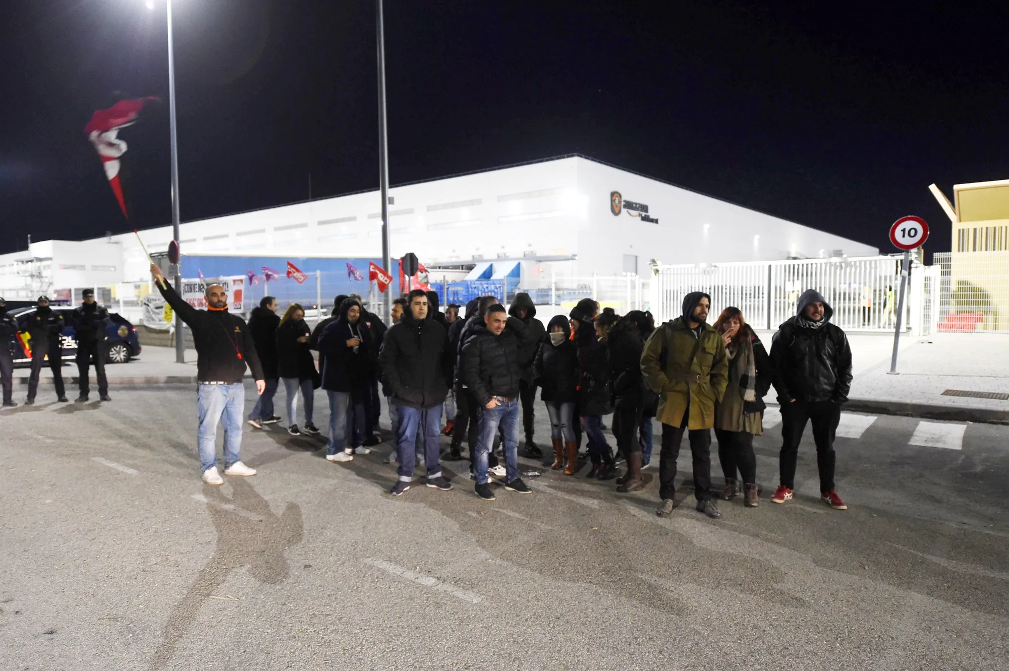 Workers protest outside an Amazon facility in San Fernando de Henares, Spain, on Nov. 23.