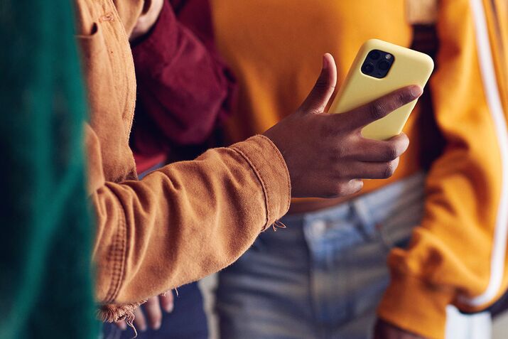 Teens using social media.