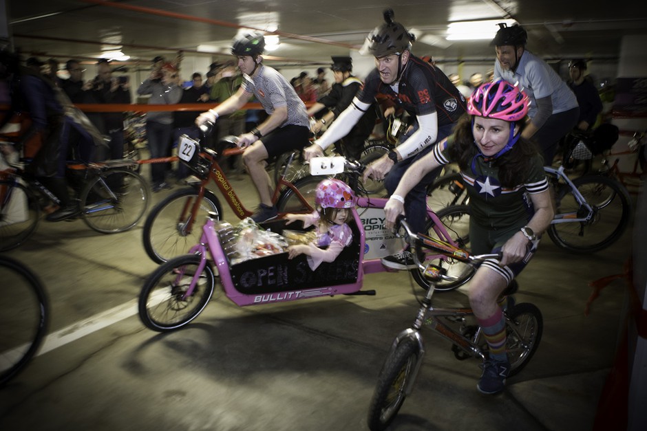 A father races with his daughter in the &quot;Anything Goes&quot; race, with a cargo bike fit for a princess.