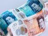 British 10 and five pound banknotes sit in this arranged photograph in London, U.K., on Wednesday, Nov. 7, 2018. Even fund managers who were once shunning the pound are now betting on a rally as the U.K. inches toward a Brexit divorce deal.