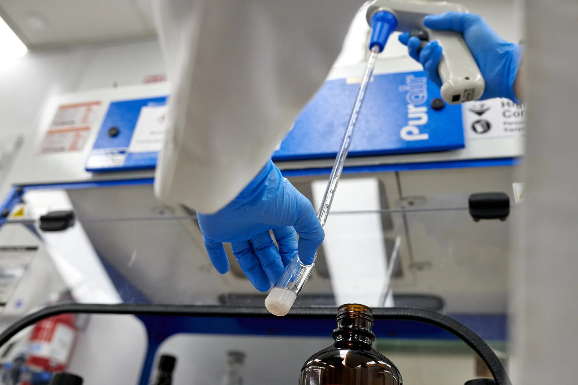 A Valisure senior research associate mixes N-Methyl-2-pyrrolidone solvent with a&nbsp;research sample of&nbsp;Zantac 150 to test&nbsp;at the Valisure lab in New Haven.