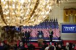 U.S. President Donald Trump, center, speaks during an election night party in the East Room of the White House in Washington, D.C., U.S., on Wednesday, Nov. 4, 2020.