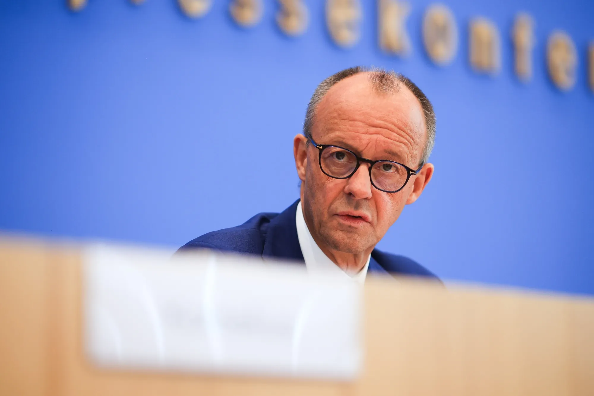 Merz Vows to Focus on Boosting Economy After Bumpy Start in Job - Bloomberg