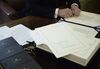 Donald Trump prepares to sign the Tax Cut and Reform Bill on Dec. 22.