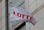 SEOUL, SOUTH KOREA - A Lotte flag files outside the Lotte Department store(Photo by Chung Sung-Jun/Getty Images)