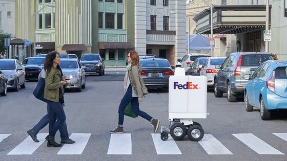 Ford’s Way to Finish Driverless Deliveries: Package-Carrying Robots