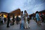Celebrities and guests attend a fashion show party at the Ming Dynasty City Wall Relics Park in Beijing in June 2013.