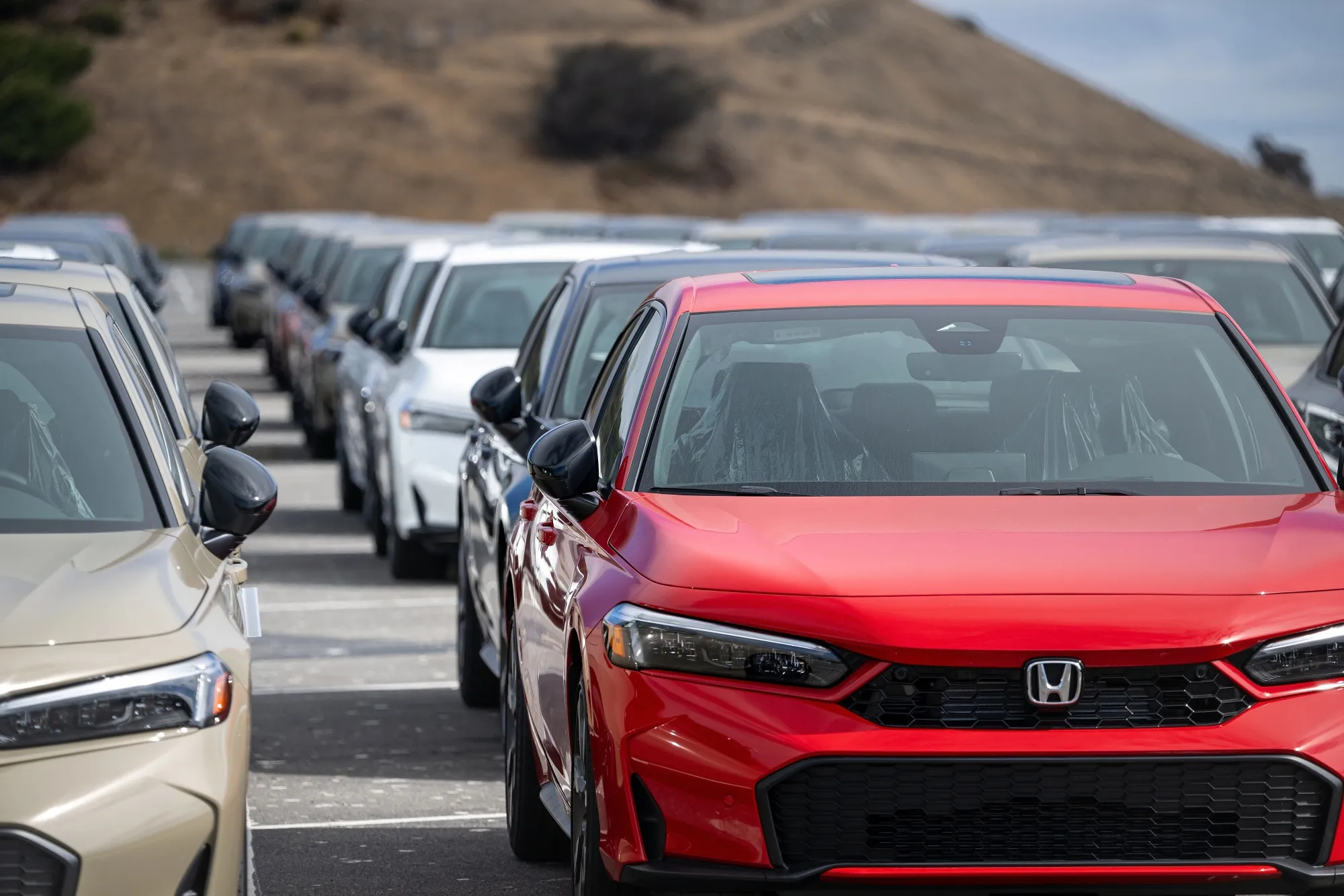 New Honda vehicles in a storage lot in Richmond, California.