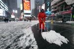 Snow is cleared in Times Square, New York City, on Jan. 7. A winter storm has blanketed the Northeast.