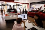 Inside The Tesla Inc. Newport Beach Showroom As Model 3 Hits Target