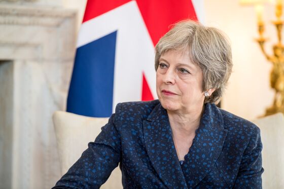 Brexit Bulletin: May Staggers On