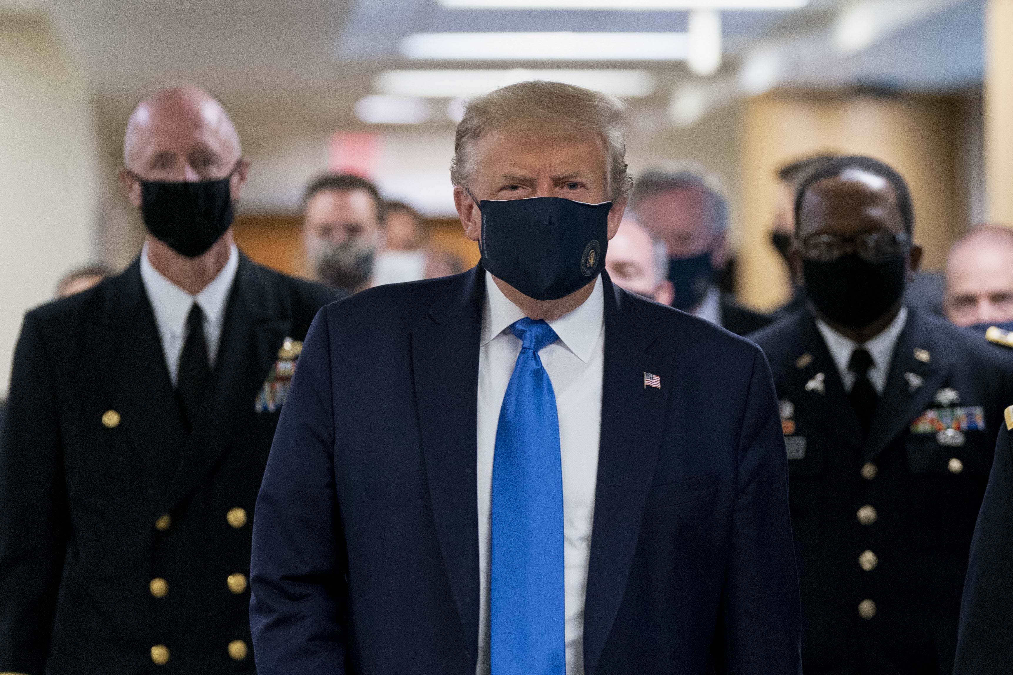 Donald Trump wears a protective mask while visiting Walter Reed National Military Medical Center in Maryland, on July 11.