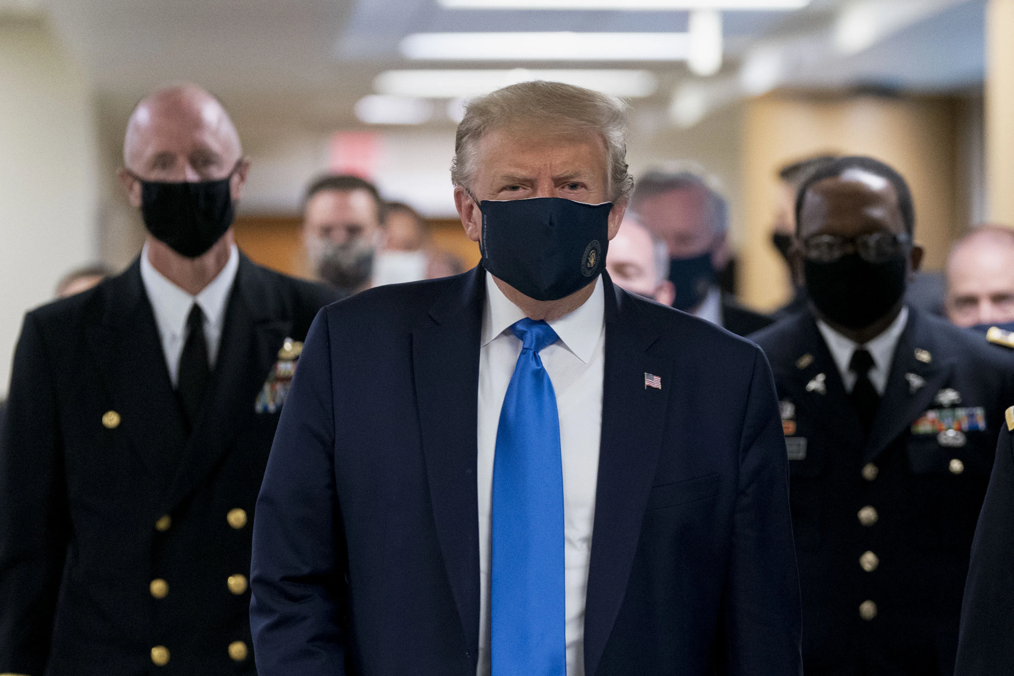 Donald Trump wears a protective mask while visiting Walter Reed National Military Medical Center in Maryland, on July 11.