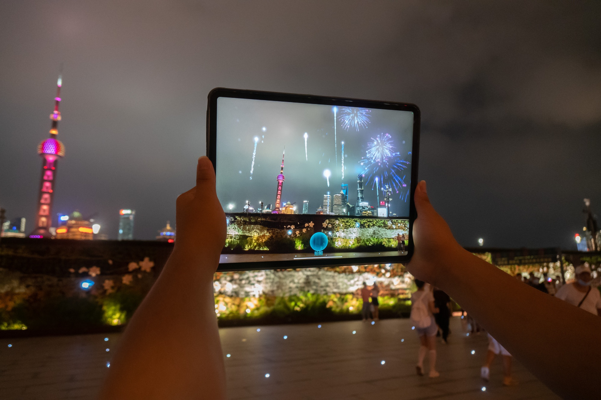 A “digital twin” app creates an image of a fireworks-filled Shanghai skyline at&nbsp;the 5th World Conference on Artificial Intelligence in 2022.&nbsp;