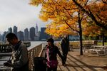 Long Island City, Queens, residents walk through Gantry Plaza State Park.