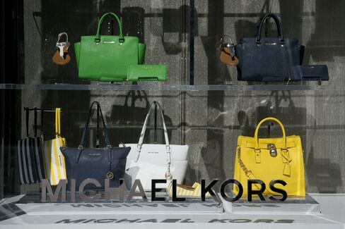 Handbags Sit on Display at a Michael Kors Store in Washington
