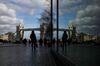 A window reflects Tower Bridge in London, U.K., on Tuesday, Feb. 19, 2019. London's office market could be headed for a fall whether the U.K. leaves the European Union with or without a deal, according to one broker that predicts a downturn.