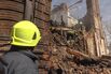 Rescue workers at the site of damaged buildings following a Russian air attack in Dnipro, Ukraine, on APril 16.