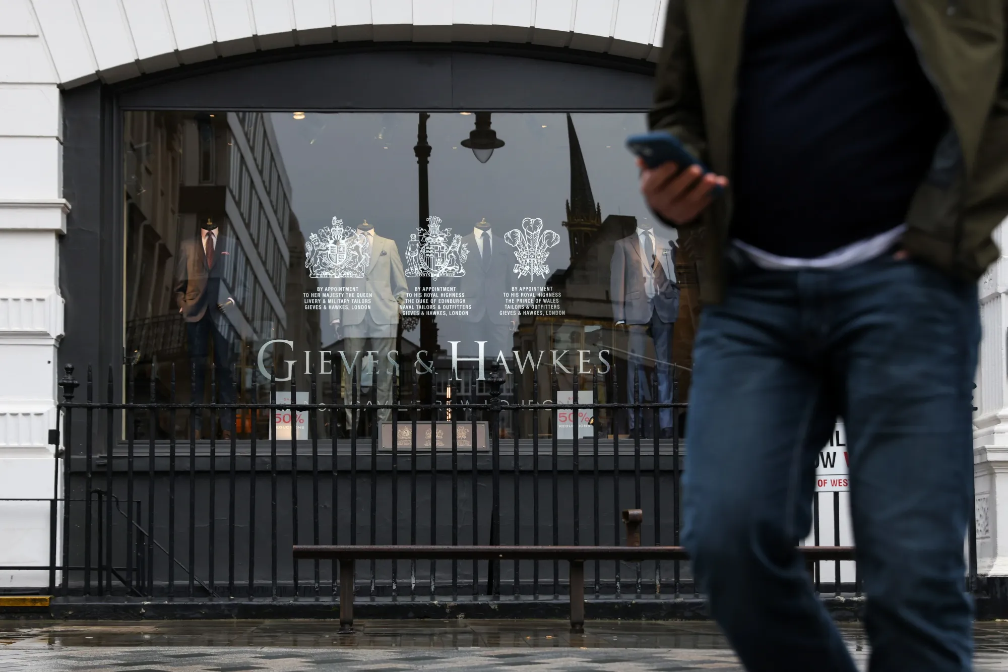 A Gieves &amp; Hawkes tailors on Savile Row&nbsp;in London.