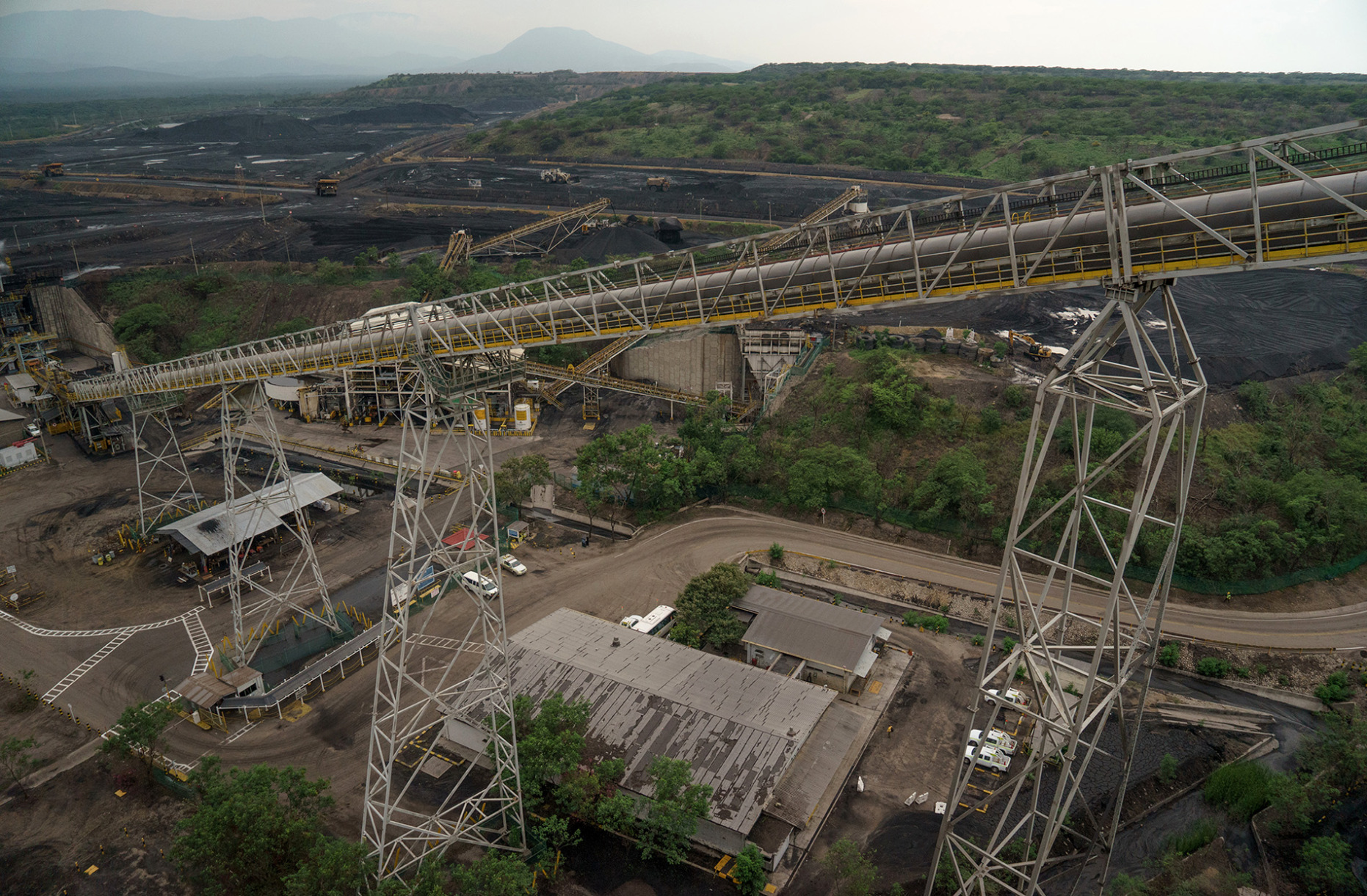 Coal is transported on a conveyor belt to silos at the Cerrejon coal mine complex near the village of Albania, Colombia.
