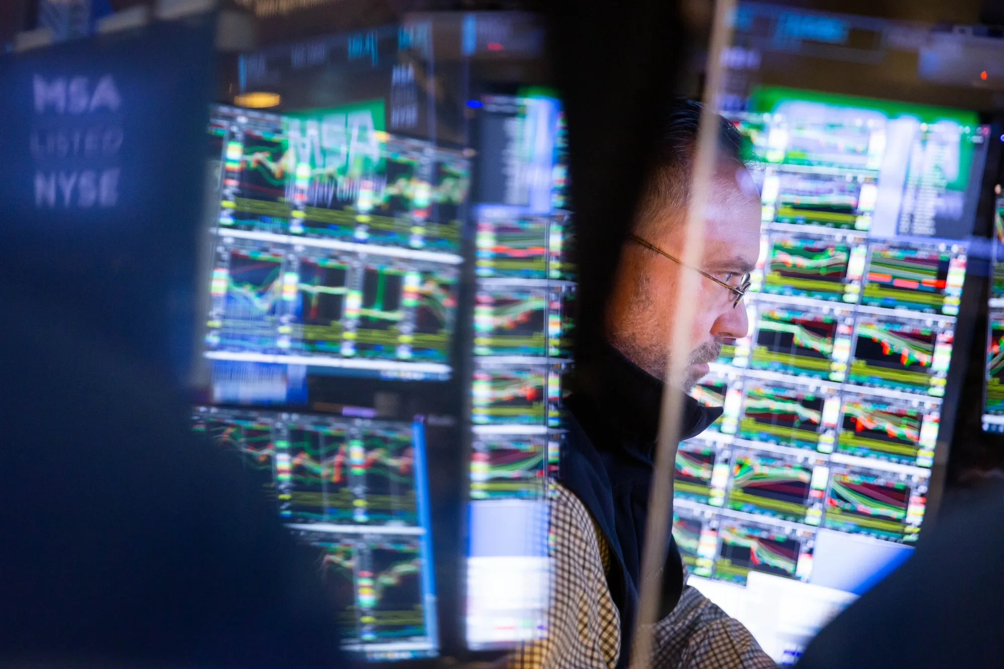 A trader works on the floor of the New York Stock Exchange.&nbsp;