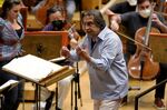 Italian conductor Riccardo Muti, 80, rehearses Verdi's &quot;Un Ballo in Maschera (A masked Ball)&quot; with the Chicago Symphony Orchestra in Chicago on Wednesday, June 22, 2022. Muti, whose Chicago contract runs through the 2022-23 season, considers himself the descendant of strong Italian conductors reaching back to Arturo Toscanini and Tulio Serafin. (AP Photo/Nam Y. Huh)